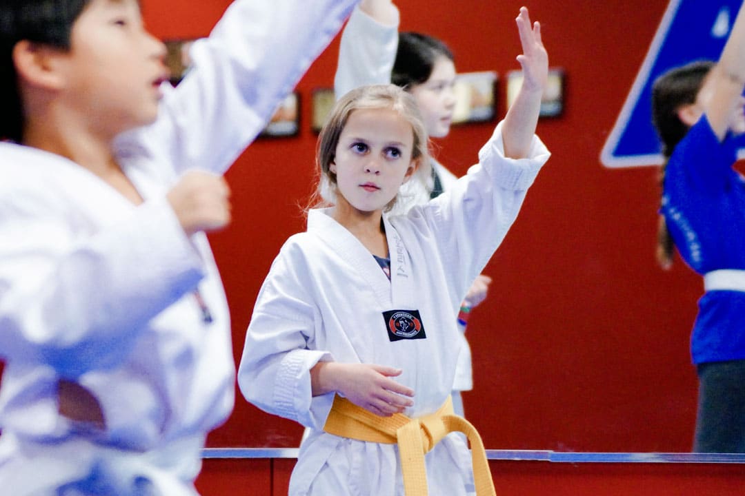 martial-arts-for-kids-7-12-focus-confidence-classroom Martial arts class for kids ages 7 to 12 building focus, confidence, and listening skills that carry into the classroom